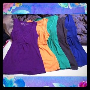 Victoria’s Secret babydoll tanks.